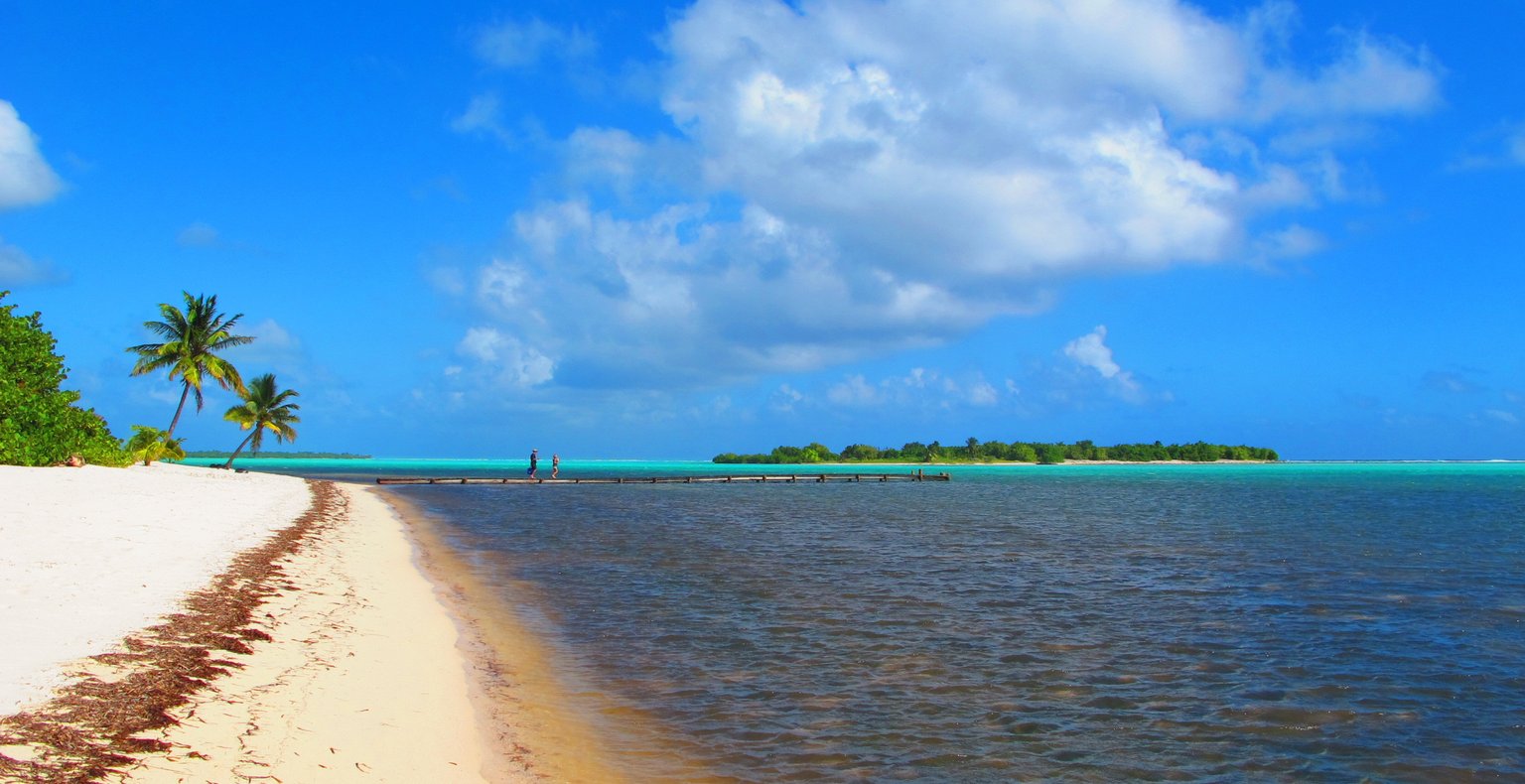 Encontre voos baratos to Little Cayman
