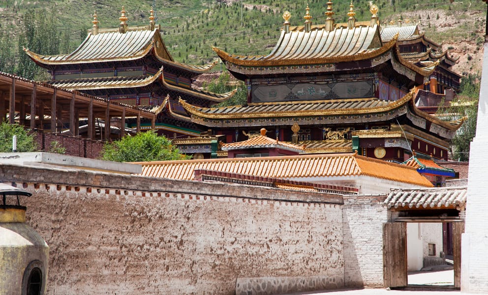 Vuelos baratos de Lijiang, China a Tong'ren, China